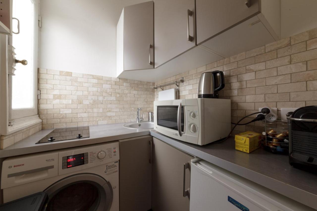 Appartamento Private Studio - Avenue des Champs-Elysées Parigi Esterno foto